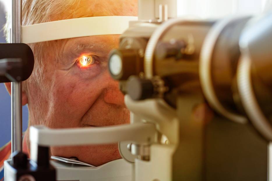 man at an ophthalmologist appointment